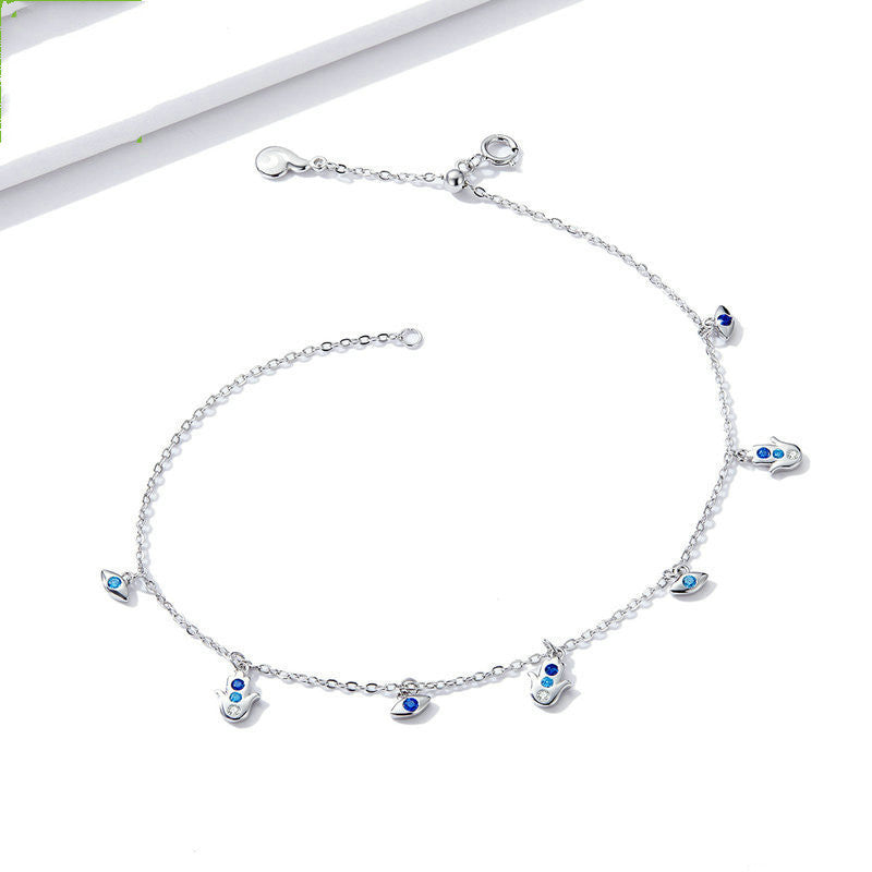 Bijou de cheville en argent avec œil bleu et palmier