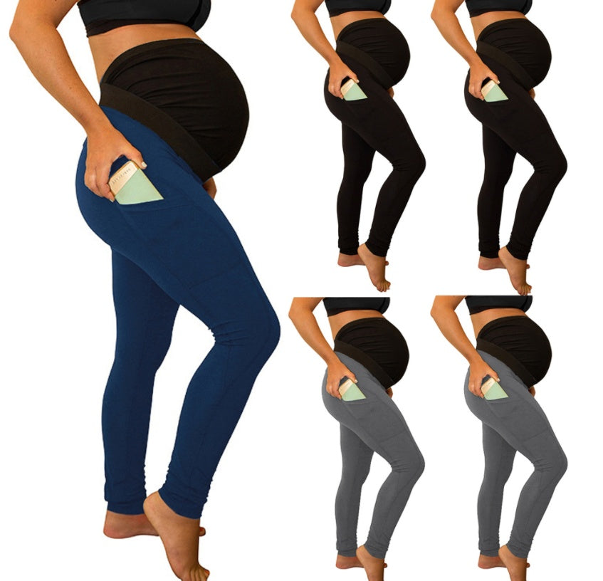 Pantalon de maternité à panneau de couleur pure, taille longue et haute, avec poches latérales