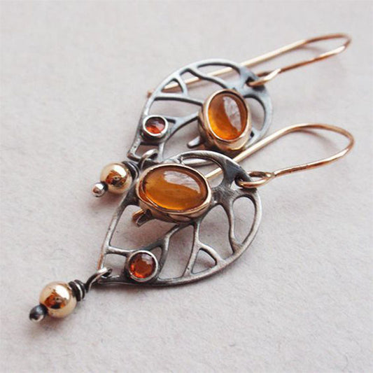 Boucle d'oreille en forme de feuille évidée pour femme