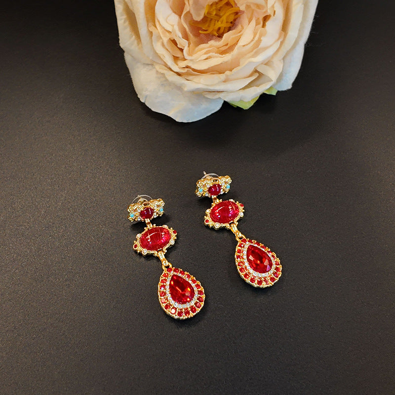 Ensemble collier, bracelet et boucles d'oreilles en verre creux