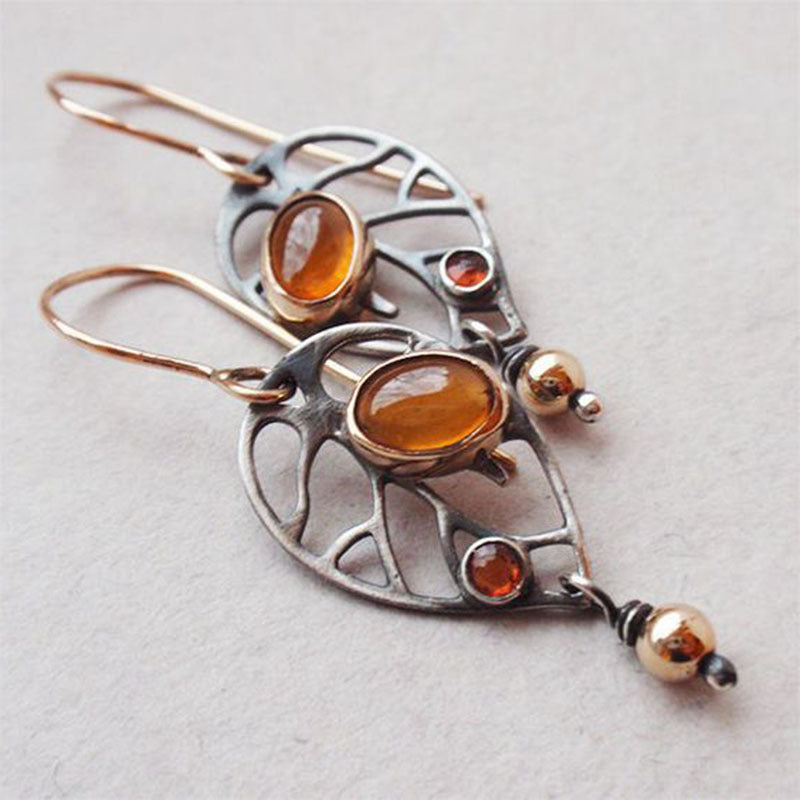 Boucle d'oreille en forme de feuille évidée pour femme