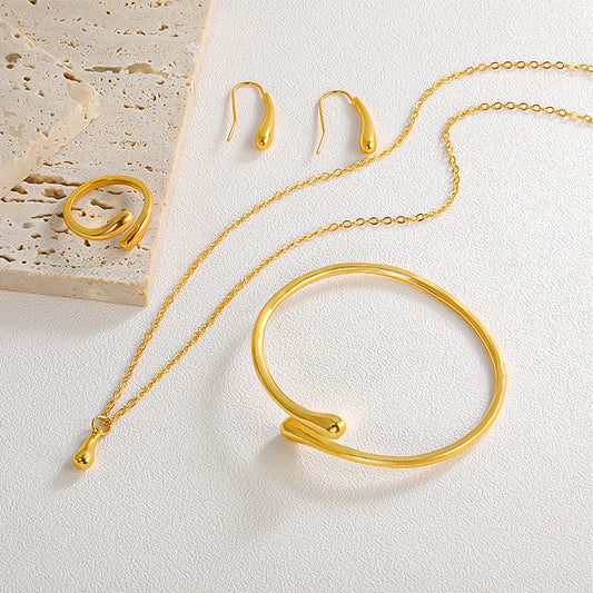Ensemble collier, boucles d'oreilles, bague, bracelet en forme de goutte, quatre pièces