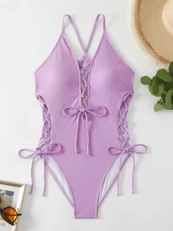 Aoaiiys Maillot de bain dos nu pour femme, monokini ajouré, lacé, string sexy, été 2025, plage, couleur unie, tendance