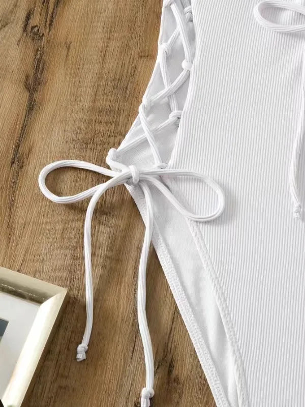 Aoaiiys Maillot de bain dos nu pour femme, monokini ajouré, lacé, string sexy, été 2025, plage, couleur unie, tendance